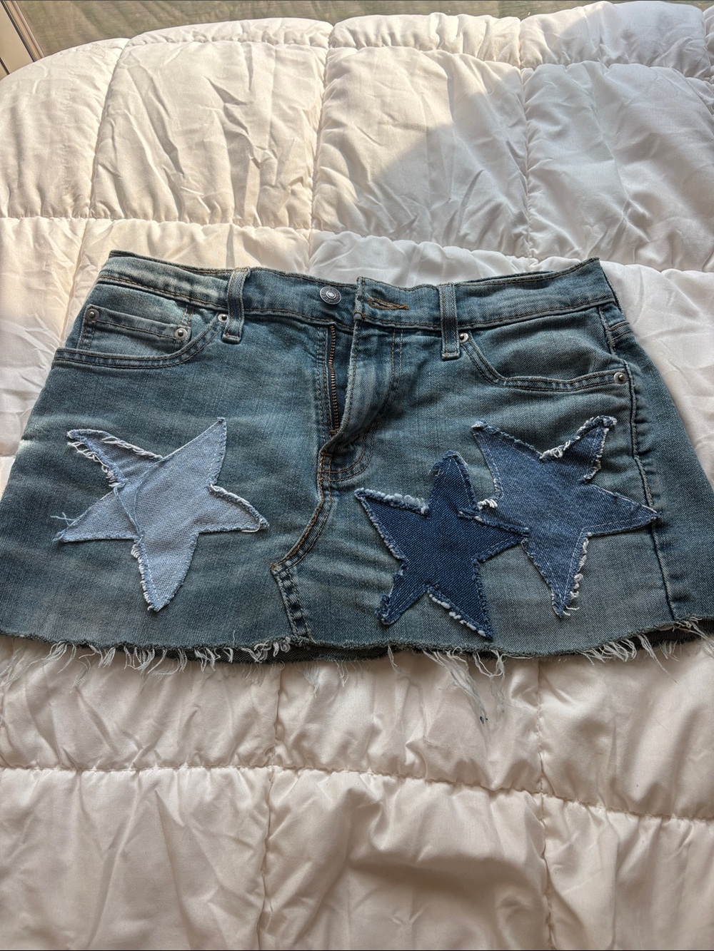 Levi's Blue distress denim mini skirt w patchwork stars